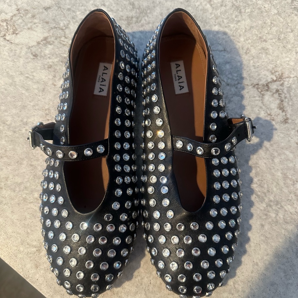 Alaia Black Flats with Silver Accents